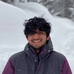 Mihir Sukhatme in the snow, presently an undergraduate researcher in the Pajukanta lab.